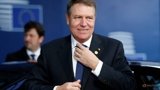 Romania's President Klaus Werner Iohannis arrives to attend a European Union leaders summit in Brussels, Belgium, December 14, 2017.
